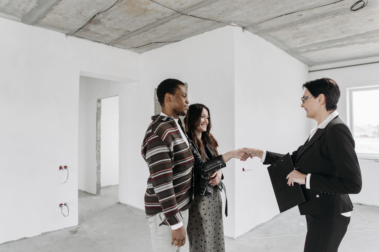 Contractor shaking hands with a client